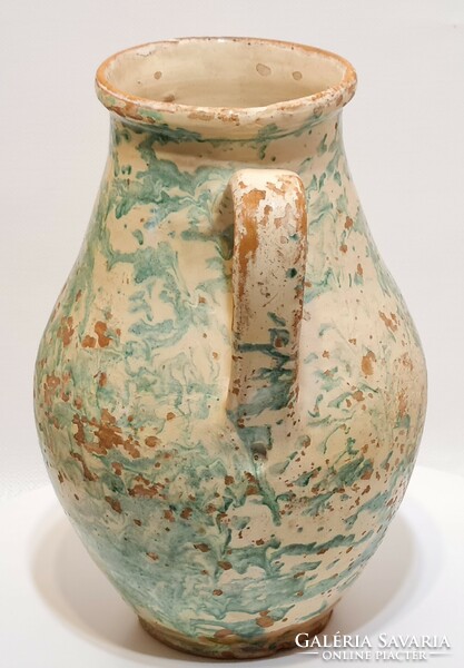 Folk ceramic milk jug with light green glaze spots and white glaze (2965)