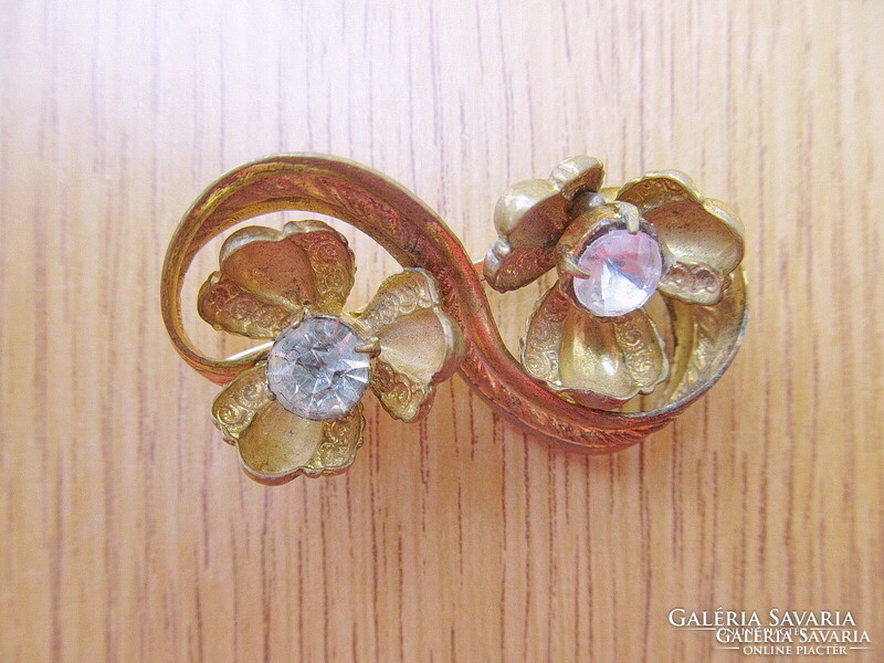 Old gilded stone brooch with badge