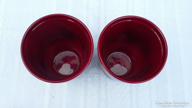 2 burgundy ceramic bowls