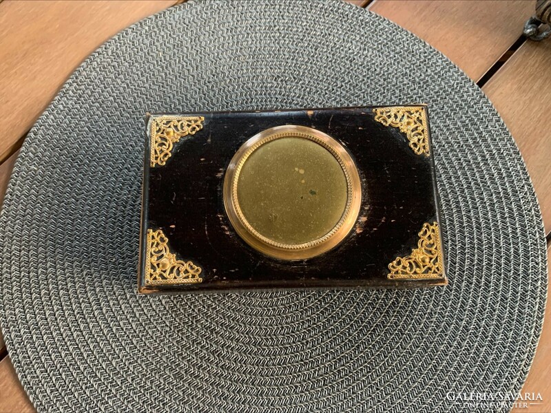 Antique wooden box with copper hammer