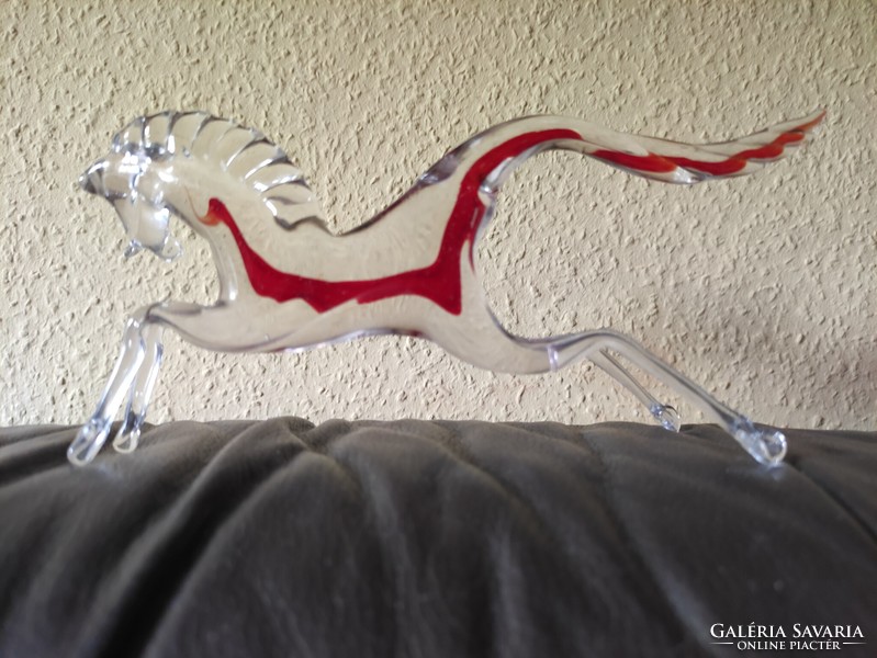 Colorful galloping glass horse. From the legacy of photographer G.