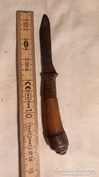Small knife with an old bone handle