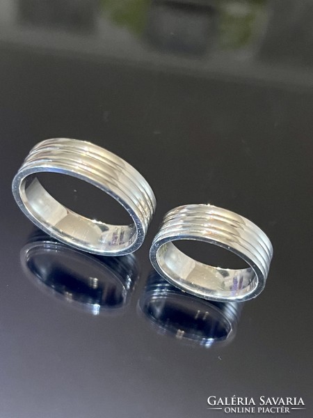 Pair of shiny silver wedding rings
