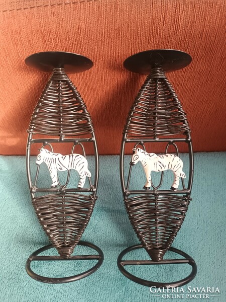 Pair of iron candle holders, painted zebra decoration, braided body.