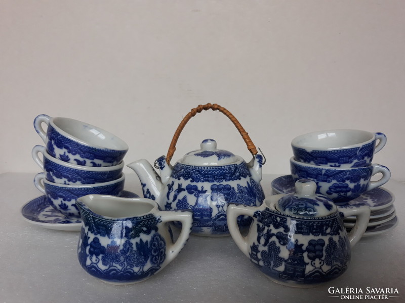 Beautiful toy porcelain tea set for a doll house