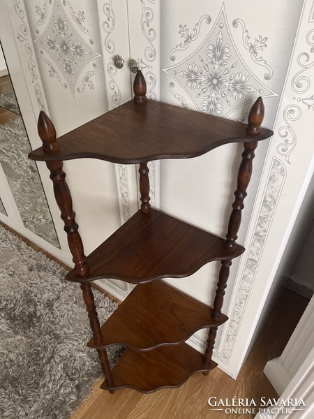 Carved table with four shelves, corner shelf.