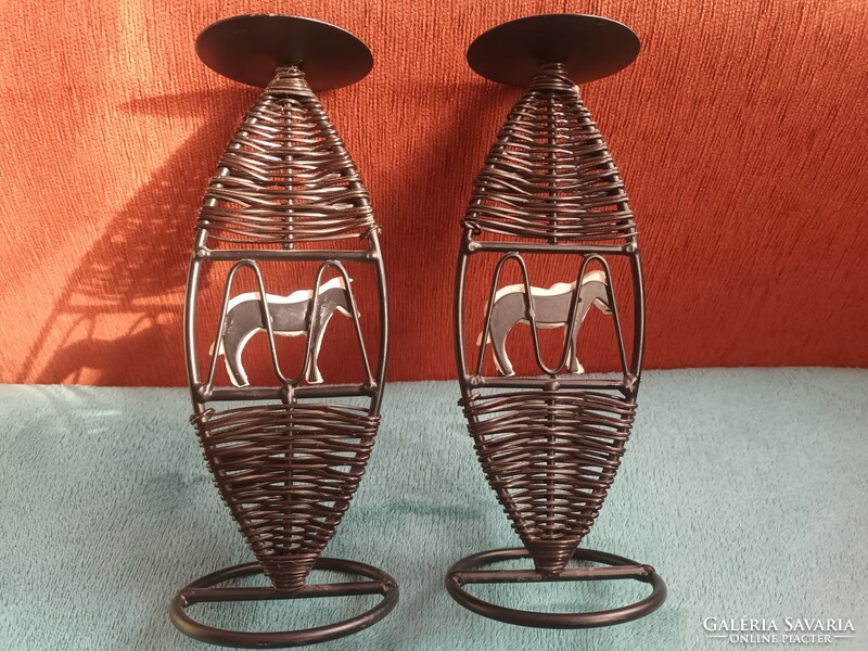 Pair of iron candle holders, painted zebra decoration, braided body.