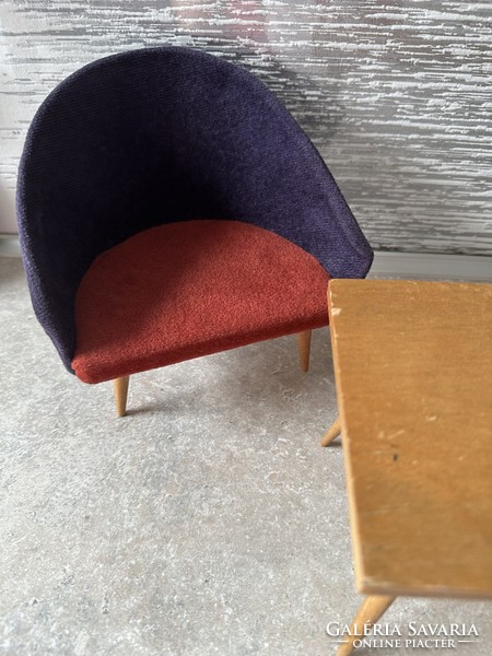 Miniature replica of a retro shell armchair from the 1960s