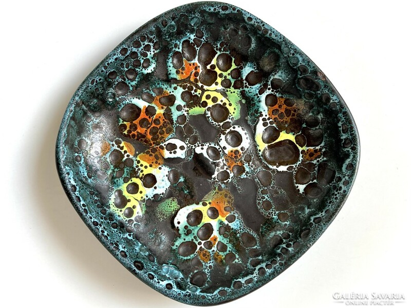 Paul Francis in ceramic bowl