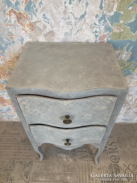 Pale turquoise nightstand with textured painting, ocher plush drawer cover