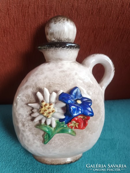 Antique marked hummel goebel cognac pourer decorated with alpine flowers