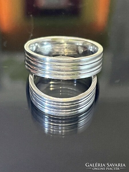 Pair of shiny silver wedding rings