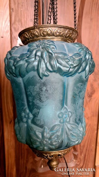 Beautiful blue glass lamp with an angel's face motif