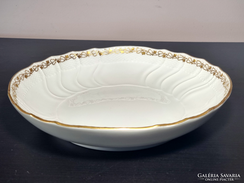 *Kpm Berlin porcelain plate, decorated with a gilded border, around the middle of the 19th century.