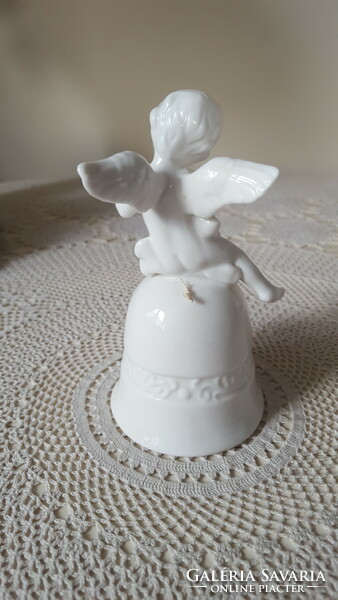 Snow-white angelic porcelain bell, bell