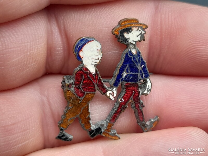 A very old fire enamel badge