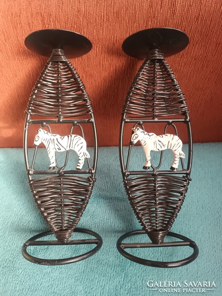 Pair of iron candle holders, painted zebra decoration, braided body.