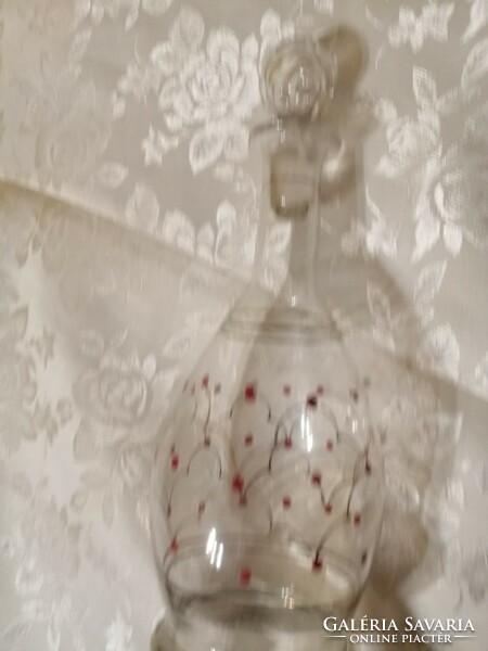 Red speckled palinka bottle