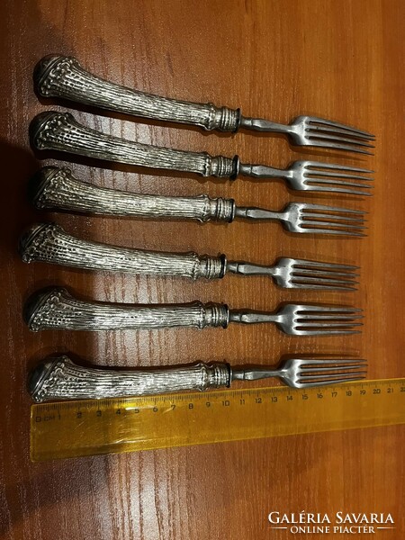 Silver-handled forks.