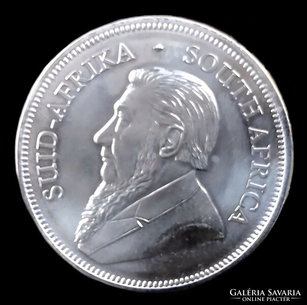 Krugerrand silver color coin, South Africa
