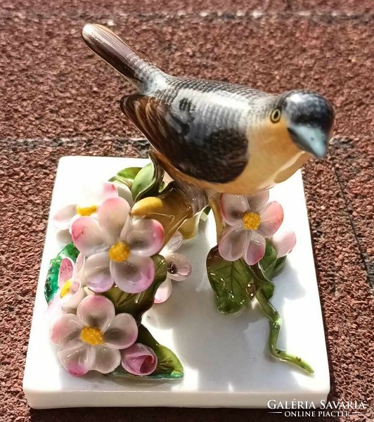 Herend bird among flowers