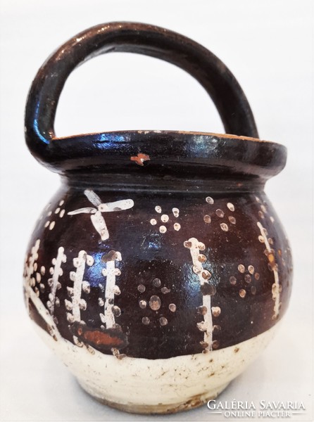 Antique folk earthenware pot with ears