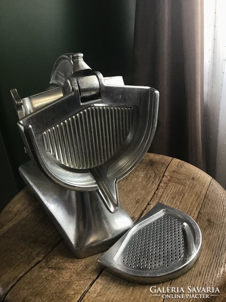 Old Swiss mechanical aluminum citrus juicer from 1940