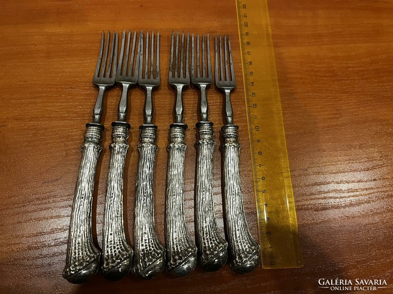 Silver-handled forks.