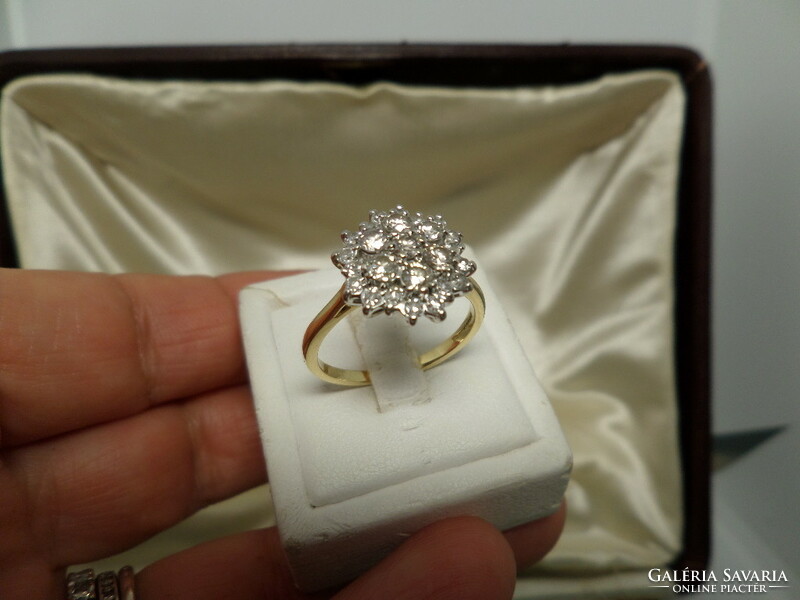 18K gold ring with many diamonds