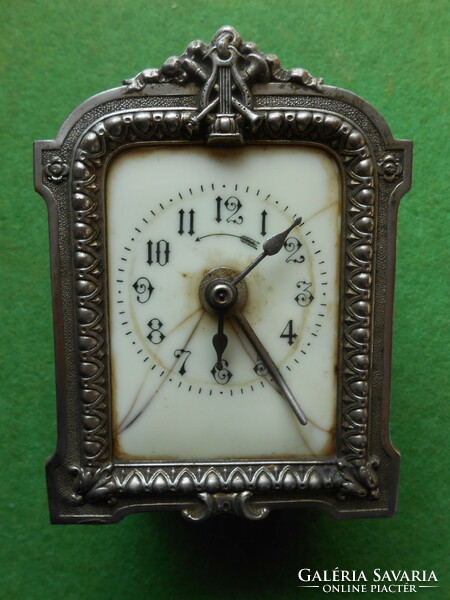 Antique travel alarm clock