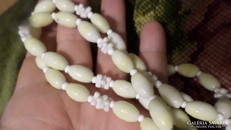 124 cm retro necklace made of butter yellow-white glass beads.