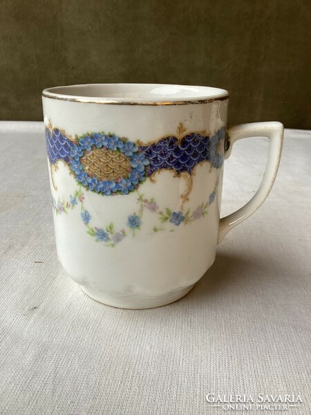 Antique porcelain flower mug.