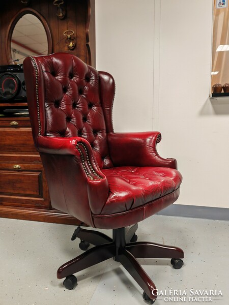 Large classic genuine leather chesterfield swivel armchair in very nice condition