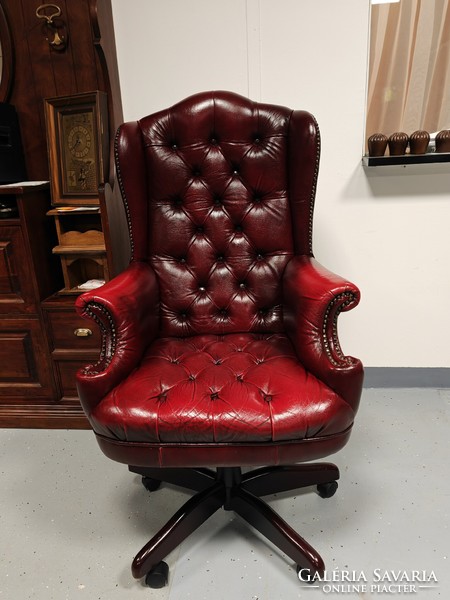 Large classic genuine leather chesterfield swivel armchair in very nice condition