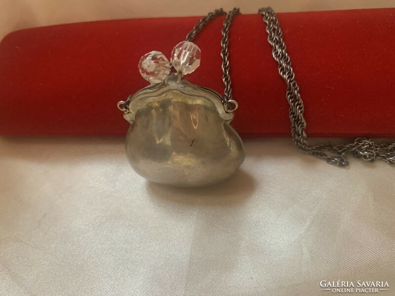 Antique change holder with polished mountain crystal. Silver