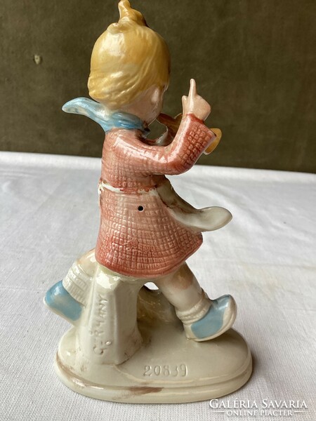 Bertran type trumpeter girl porcelain figure.