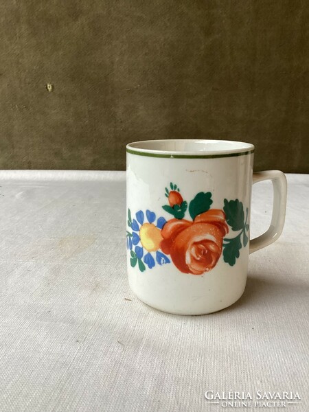 Old hand-painted porcelain mug.