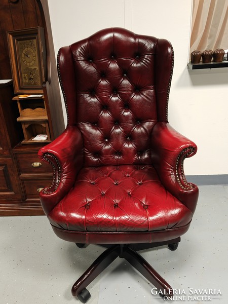 Large classic genuine leather chesterfield swivel armchair in very nice condition