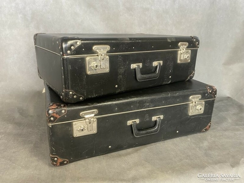 2 old suitcases