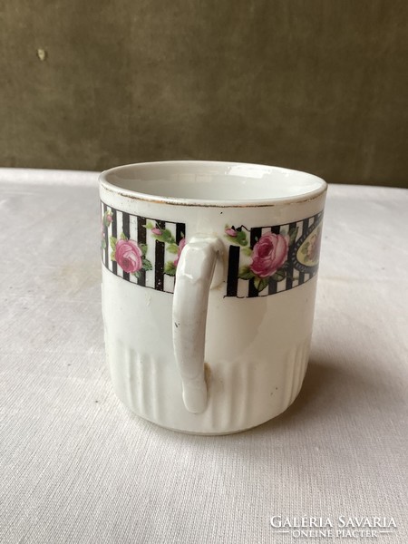 Old pink porcelain mug.