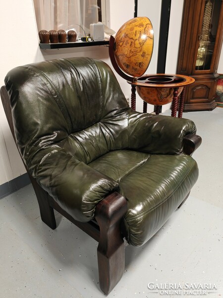 A very comfortable, large, classic genuine leather armchair in beautiful condition