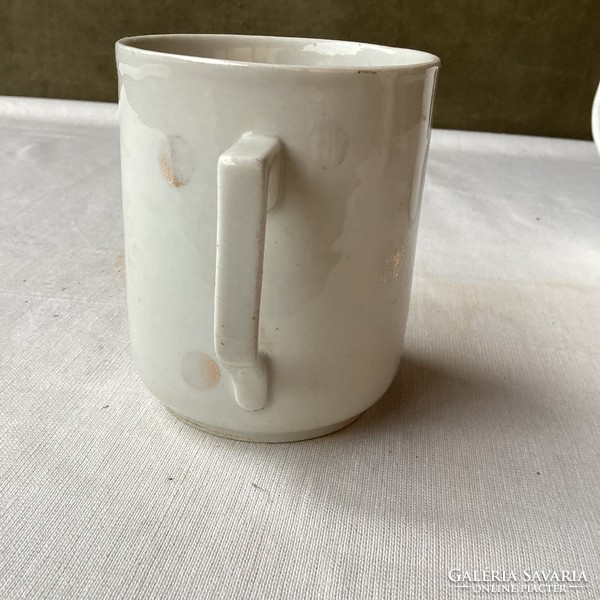 Zsolnay porcelain mug with gold dots.