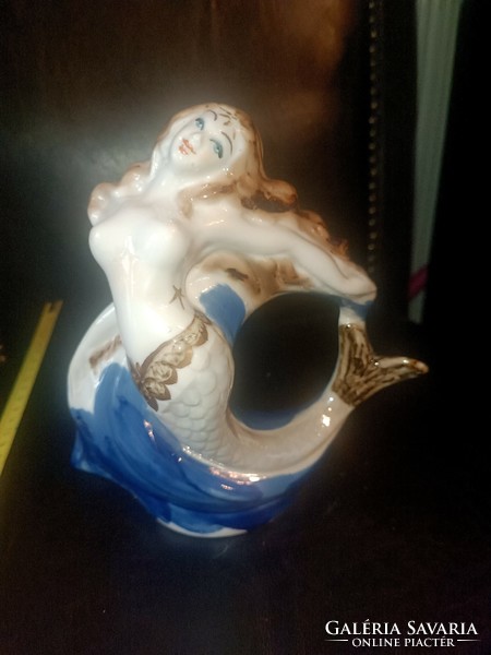 Porcelain mermaid.