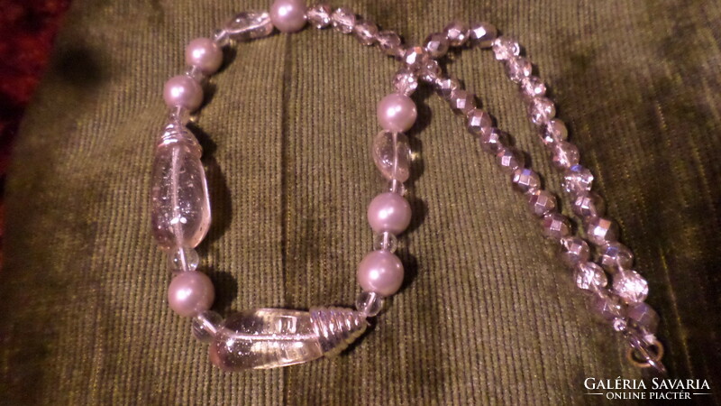 51 Cm necklace made of silvery luster and larger clear glass beads.