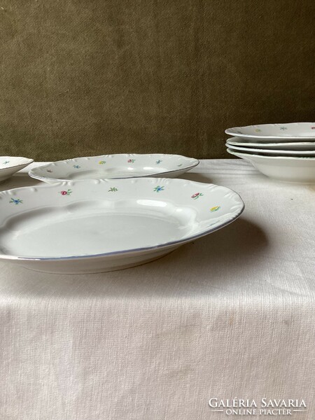 Four small flowered porcelain flat plates from Zsolna.