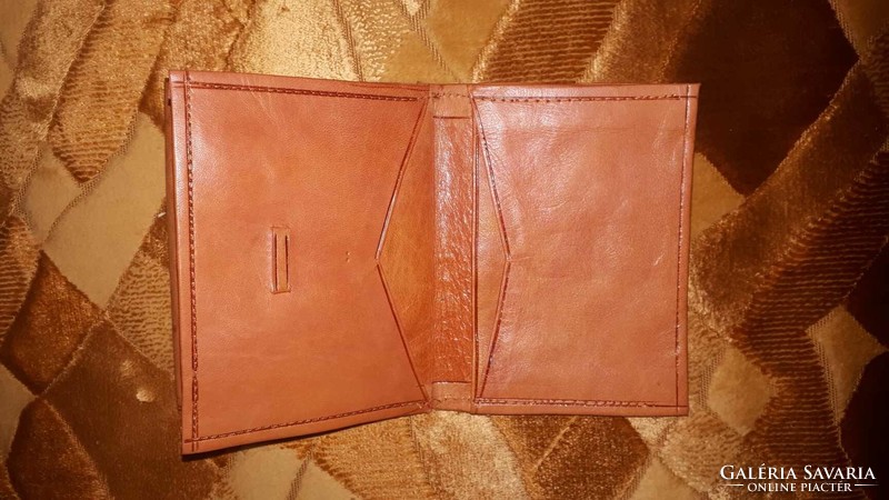 Old, unused, soft, chow-colored Australian 5-drawer men's wallet