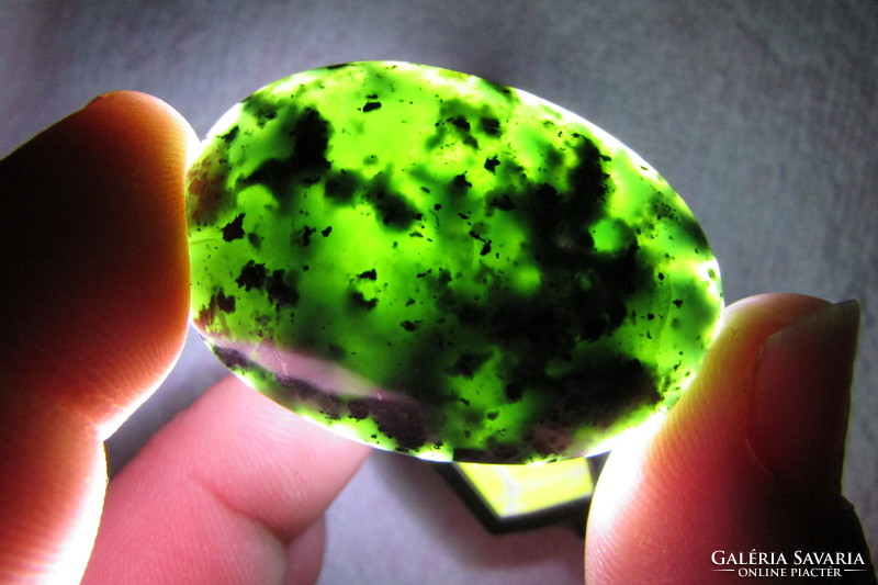 Uniquely handcrafted gem-quality serpentinite cabochon