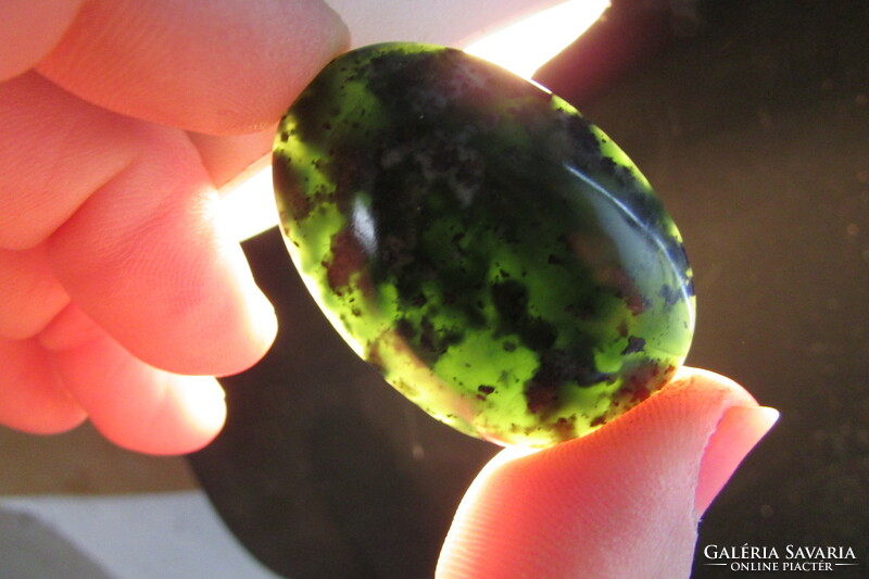 Uniquely handcrafted gem-quality serpentinite cabochon