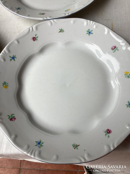 Four small flowered porcelain flat plates from Zsolna.
