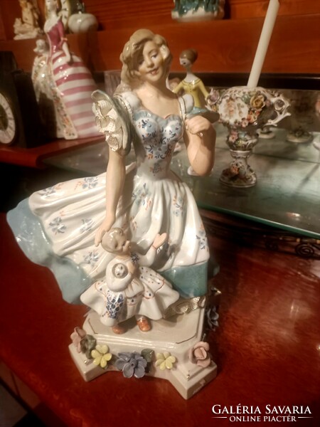 Large, rare porcelain mother with child.